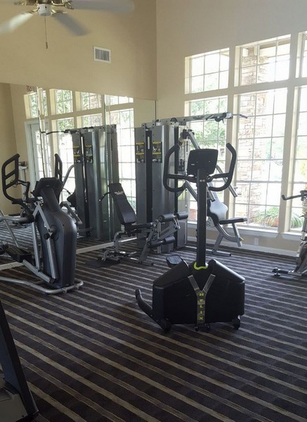 Fitness center with exercise equipments