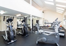 State of the art fitness center with cardio and strength training equipment