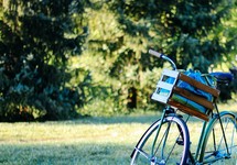 Bicycle with a basket in the park