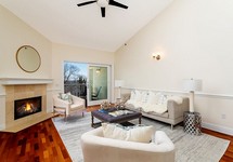 Living room with vaulted ceilings and gas fireplace