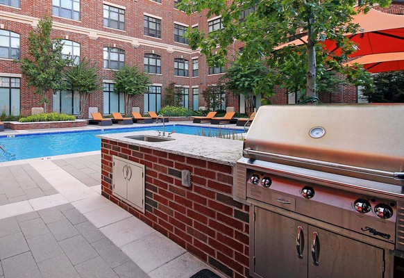 Outdoor kitchen and pool. Click to view the photo gallery.