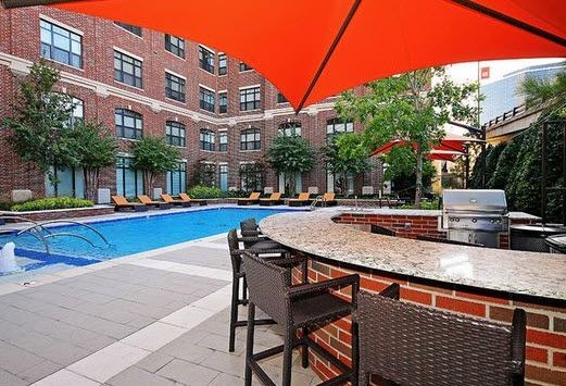 outdoor grilling and picnic area on the pool deck