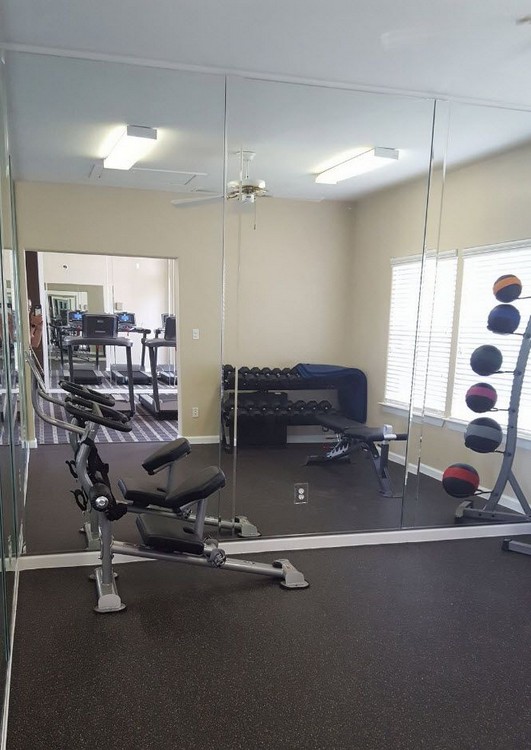 Apartment gym with exercise equipment 