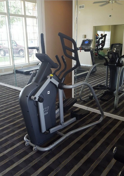 Apartment gym with cardio equipment
