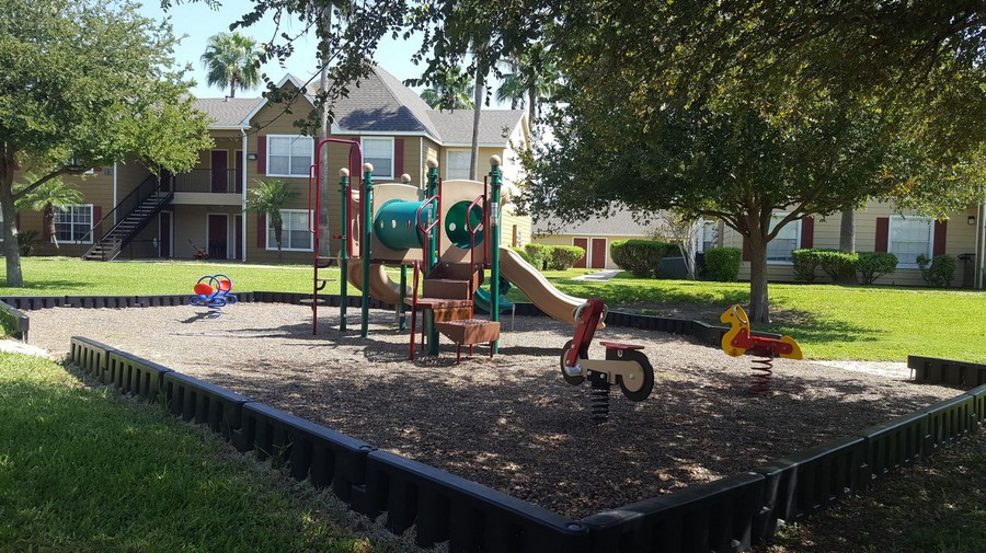 Playground with play equipment for kids