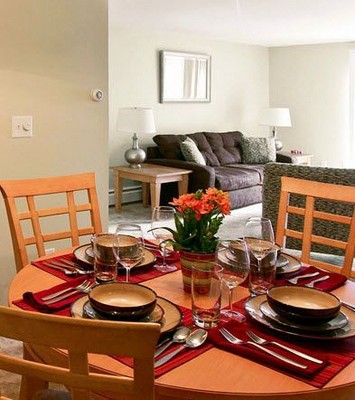Dining area with a dining table and chairs.. Click to view the photo gallery.